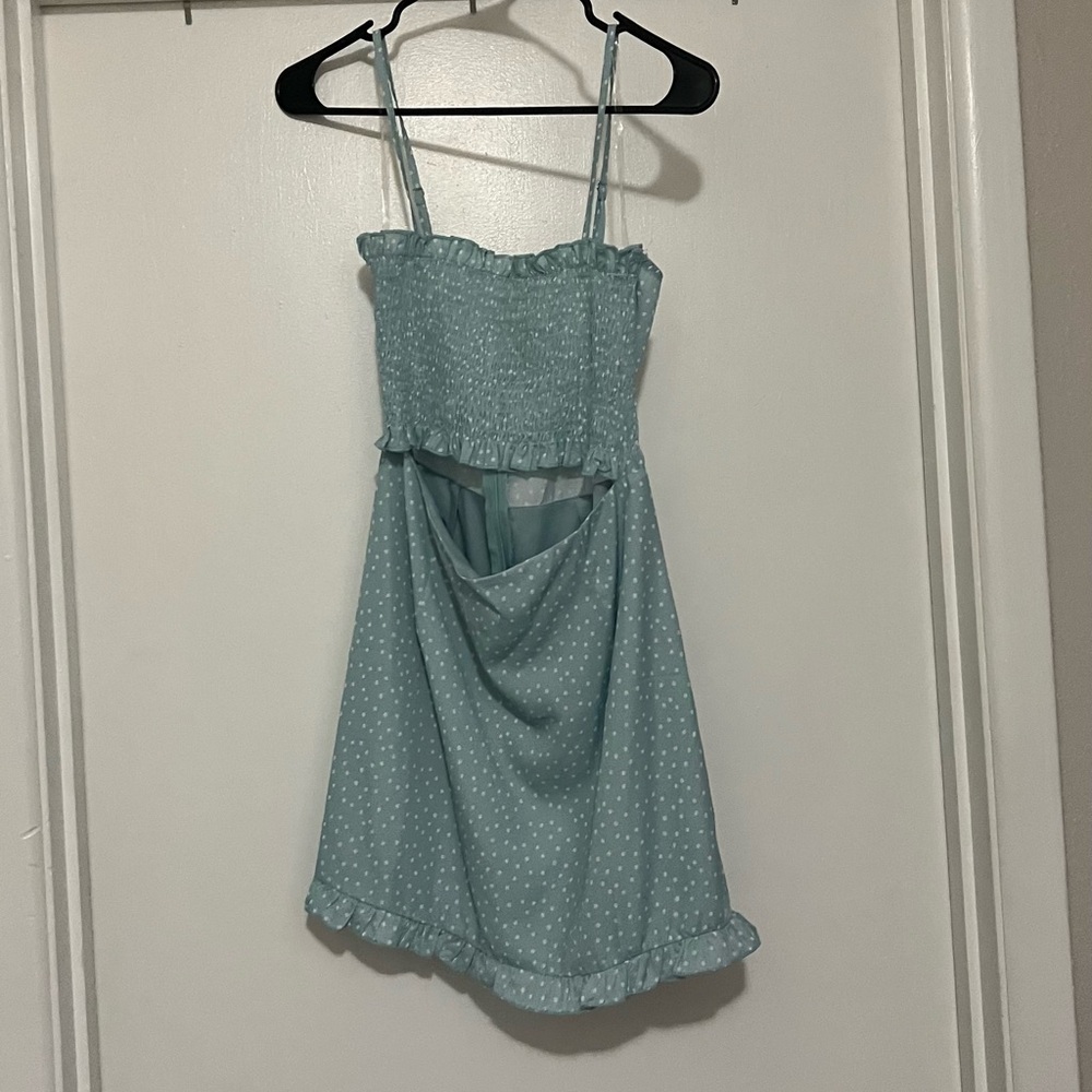 Kittenish cut out mini dress